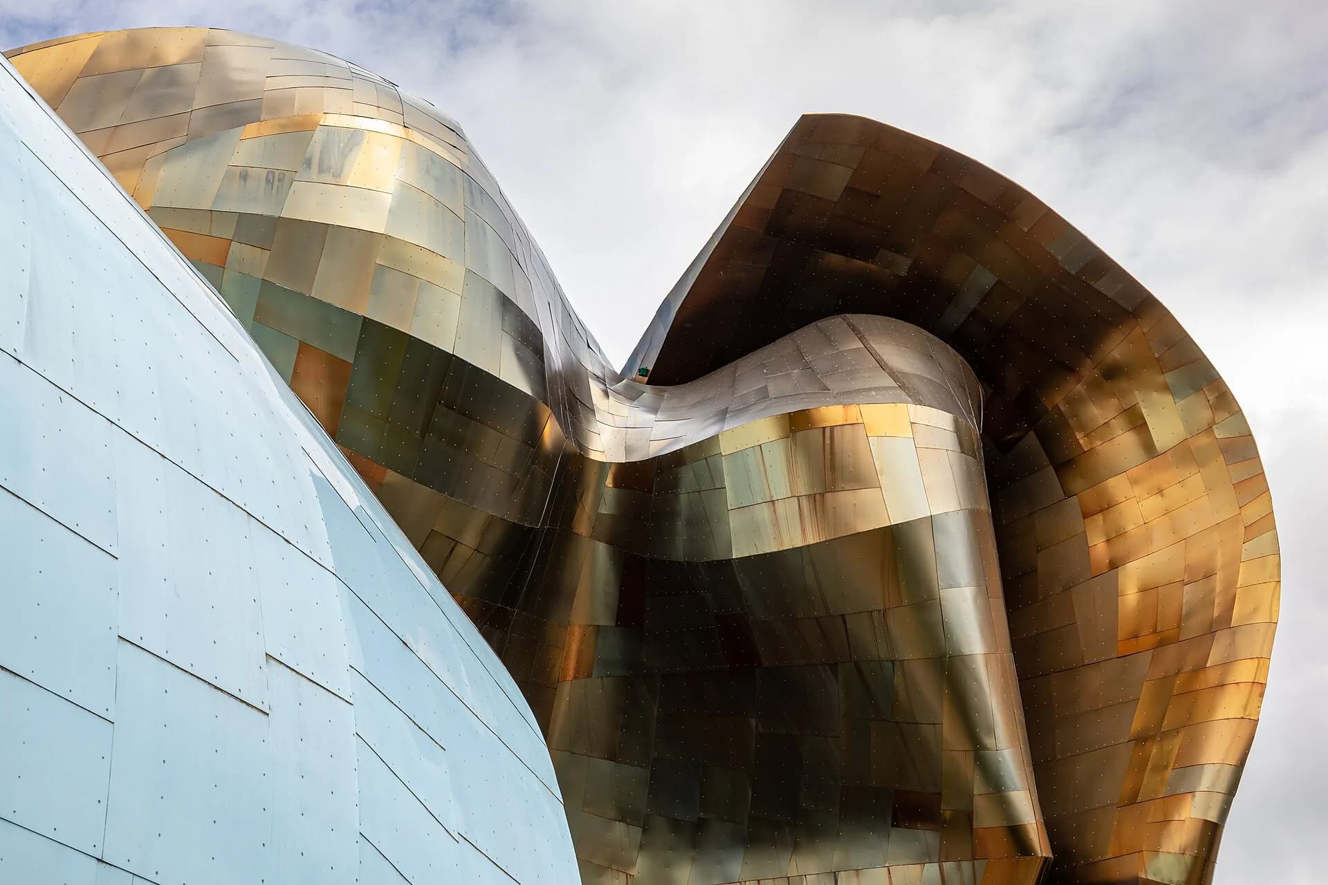 Curved metallic facade of the Museum of Pop Culture, Seattle