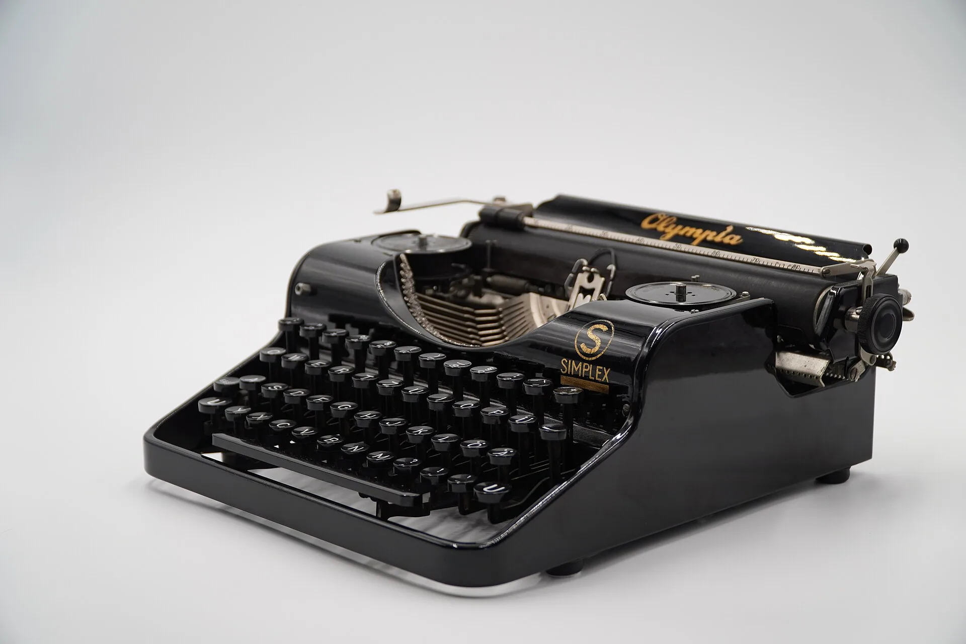Black Olympia Simplex portable typewriter